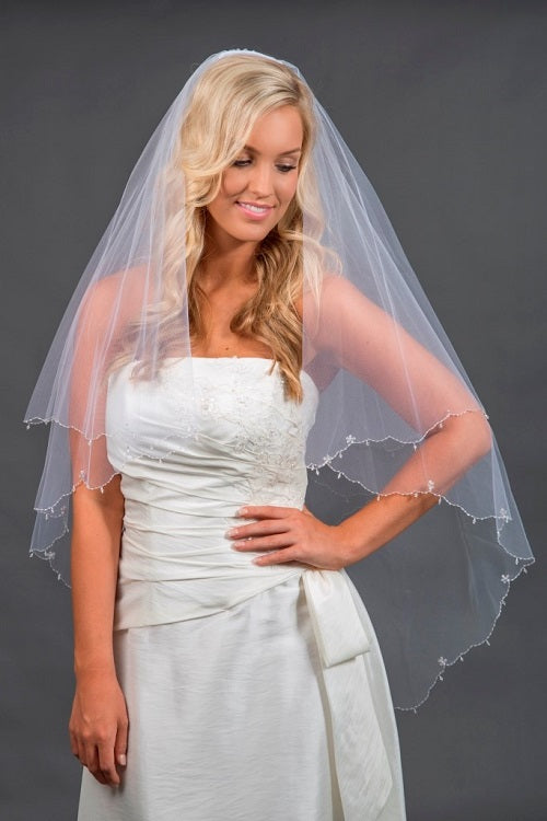 Two-tiered ivory veil with scalloped beaded edge